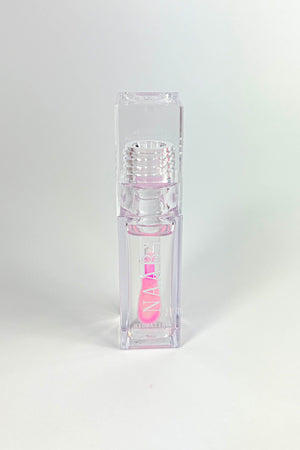 Clear lip gloss container with pink interior on a white background-Bleeding Heart color changing lip oil