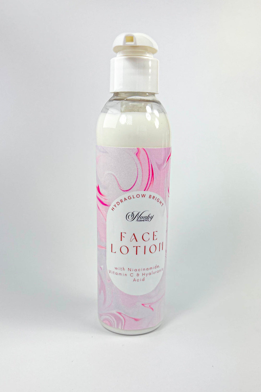 Face lotion bottle with pink floral design on a white background