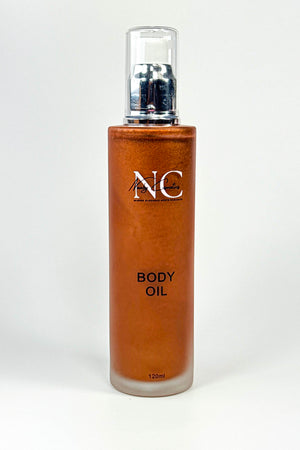 Bottle of Naaby Cosmetics Body Oil on a white background