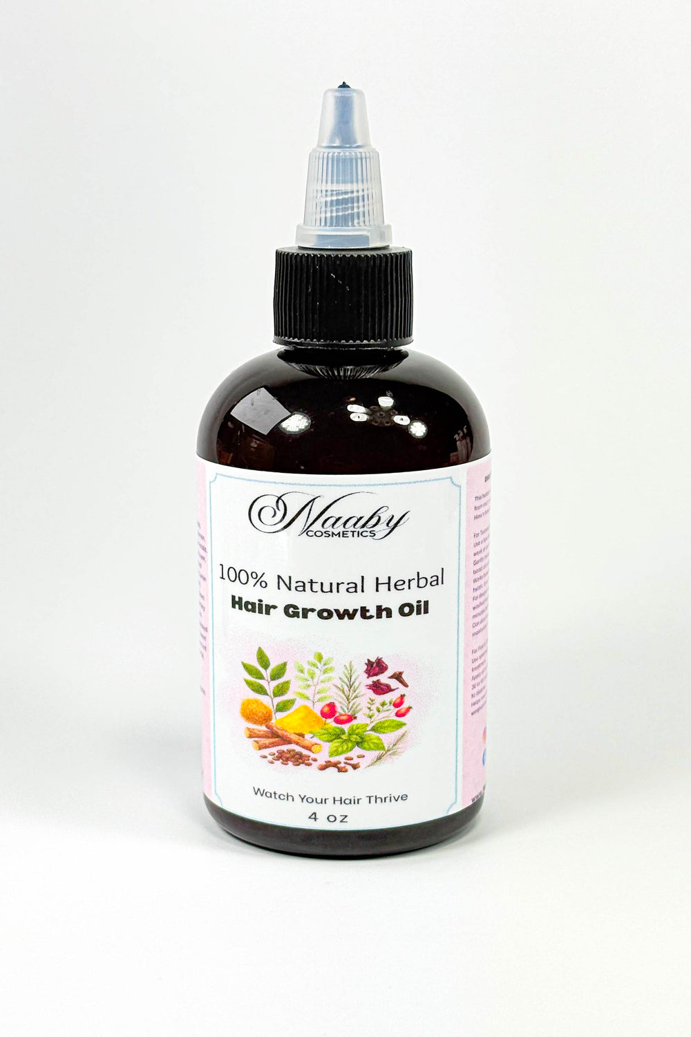 Bottle of 100% Natural Herbal Hair Growth Oil with a white label on a light gray background. Extra Strength Herbal Growth Oil – Chebe, Moringa & Ayurvedic