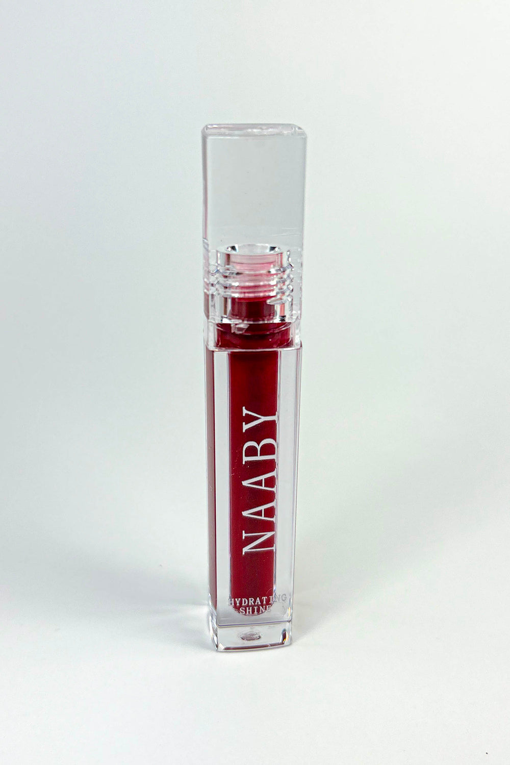 Naaby Cosmetics CRIMSON FLAME MATTE LIPSTICK with clear casing on a white background