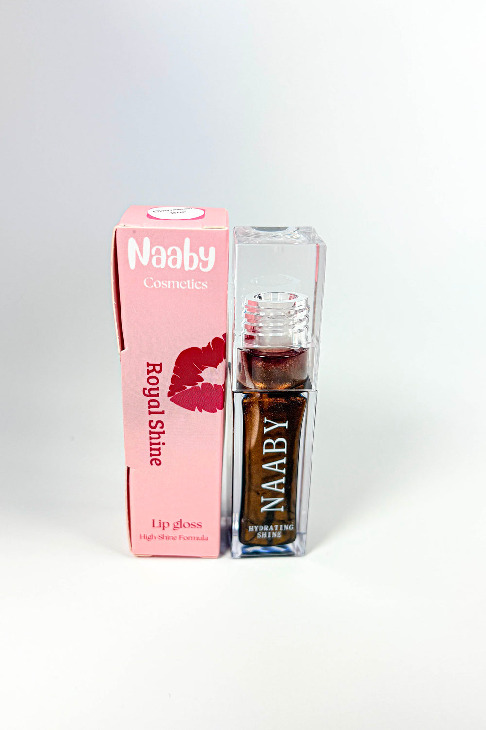 NAABY Cinnamon Bun brown  Long-Lasting Hydrating Lip Gloss in clear packaging on a white background