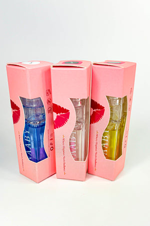 Three pink boxes with lip print design, each containing a different colored liquid.