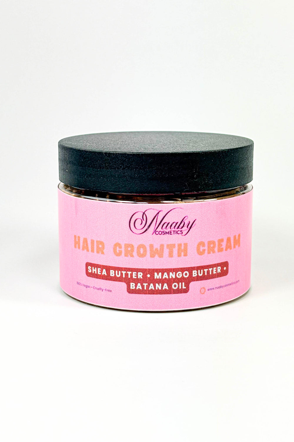 Pink jar of hair growth cream with black lid on a white background. naaby Extra Strength Hair Growth Cream – Shea, Mango & Batana