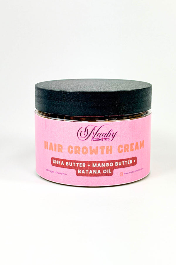 Pink jar of hair growth cream with black lid on a white background. naaby Extra Strength Hair Growth Cream – Shea, Mango & Batana