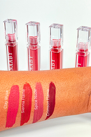 Four lipsticks with their names on a swatch of skin. Naaby_Cosmetics_MATTE_LIPSTICKs