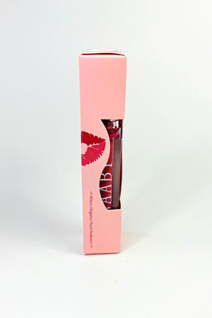 Pink xxl SPICED NUDE MATTE LIPSTICK with red lip print packaging on a white background