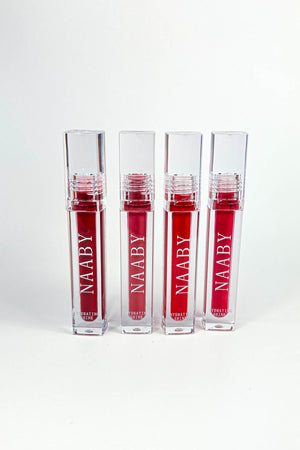 Four NAABY xxl matte  lipsticks on a white background