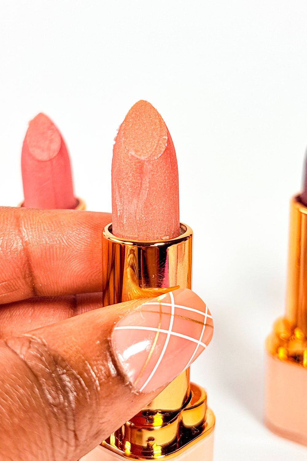 NAABY lipstick on a white background
