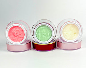 Three small jars with Vegan Peppermint, coconut, strawberry Sugar Lip Scrub – Natural Lip Exfoliator for Soft, Smooth Lips on a white background