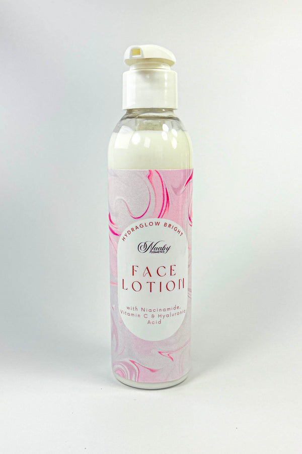 Bottle of face lotion with a pink label on a white background